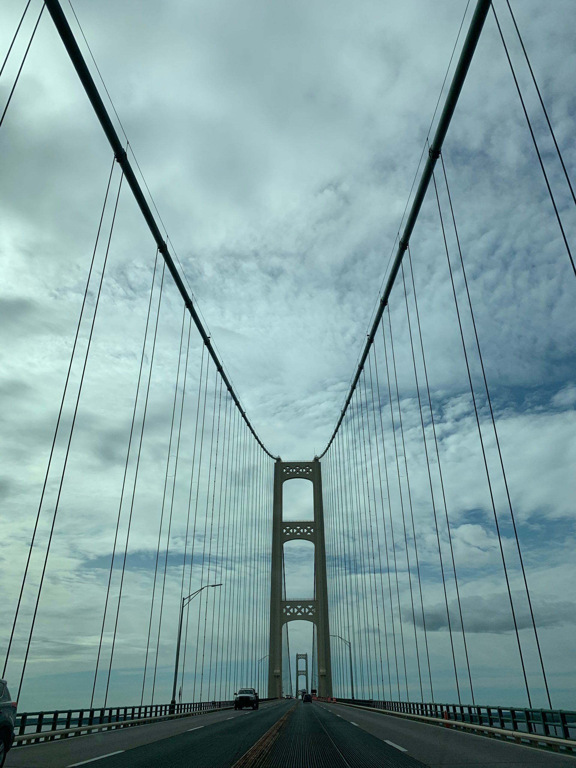 Driving across the Mackinac Bridge, both towers ahead